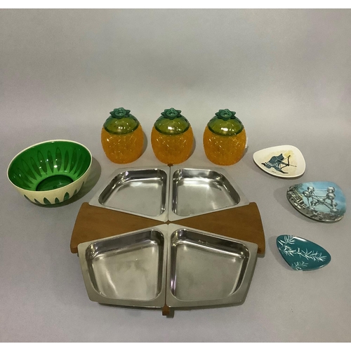 11 - A 1970's set of three plastic pineapple ice buckets labelled Malibu together with a teak and stainle... 