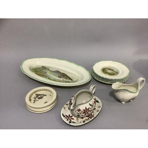 209 - A Woods ivory ware ten piece fish service including salmon platter, eight plates and a sauce boat to... 