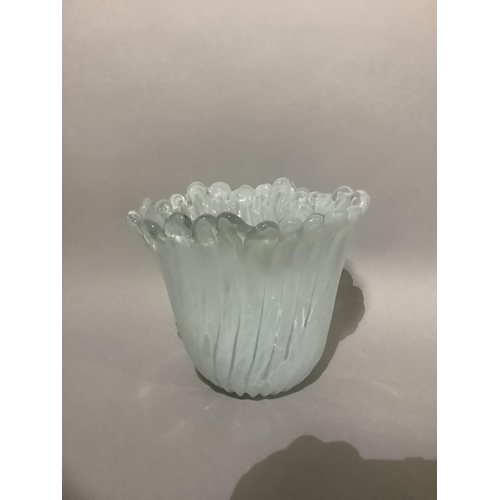 24 - A white swirl and clear glass vase of petalated form and oval outline, 26cm high