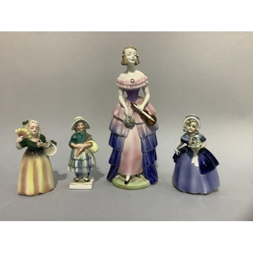 5 - A Goebel pottery figure of a violinist wearing a tiered gown, holding a violin and bouquet, impress ... 