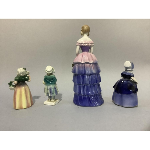 5 - A Goebel pottery figure of a violinist wearing a tiered gown, holding a violin and bouquet, impress ... 