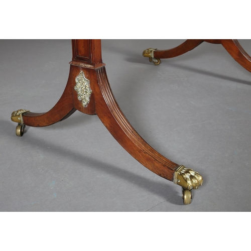 367 - A Regency mahogany and rosewood crossbanded sofa table with ebony stringing, having a drawer and dum... 