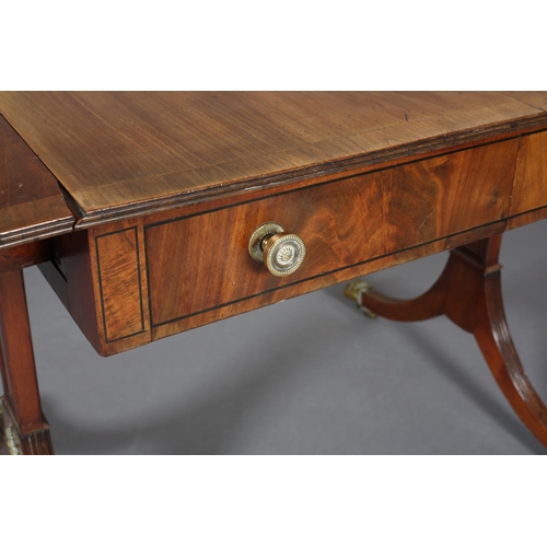 367 - A Regency mahogany and rosewood crossbanded sofa table with ebony stringing, having a drawer and dum... 