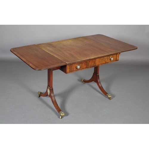 367 - A Regency mahogany and rosewood crossbanded sofa table with ebony stringing, having a drawer and dum... 