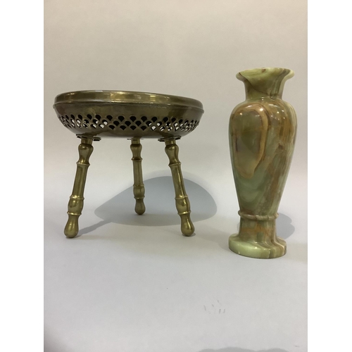 187 - An Indian or Moroccan brass heater on three legs together with an onyx vase