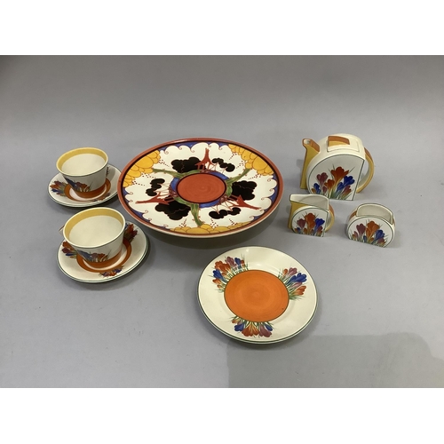 189 - A reproduction Clarice Cliff Crocus style tea for two including teapot, sugar and milk, pair of cups... 