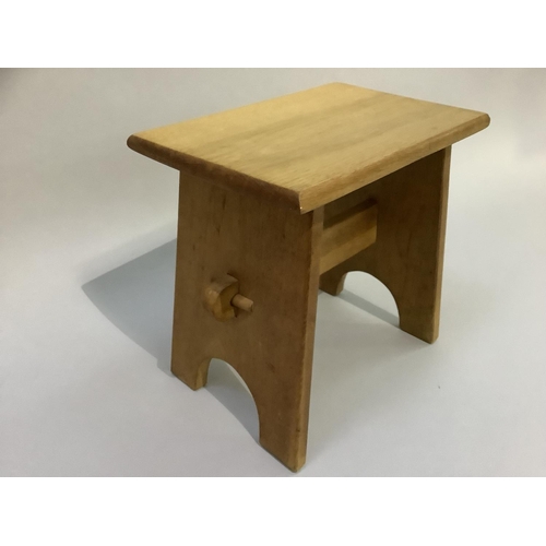 345 - A small pale oak stool on refectory panel supports, made in 1968, 30cm wide x 20cm x 29cm high