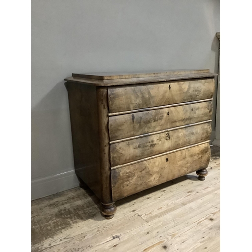 349 - A 19th century Continental walnut chest having raised tablet surface and chamfered rim above four gr... 