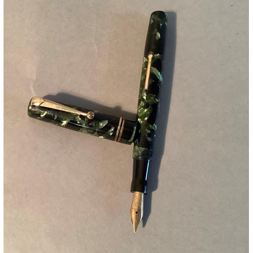 35 - A Swan self filler in marbled greed jade by Mabie Todd & Co Ltd, Phillips of Oxford 14ct gold nib, 1... 