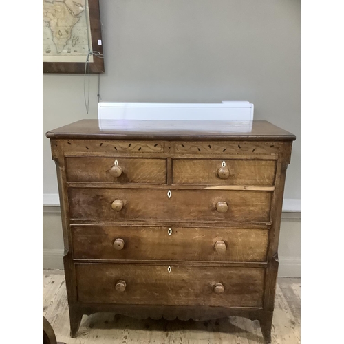 358 - A 19th century oak chest of drawers, the frieze inlaid in boxwood and ebony with scrolling leafage b... 