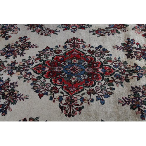 381 - ANTIQUE PERSIAN HAND-MADE SAROUGH MAHAL CARPET, cream field, with blue and crimson floral medallion ... 