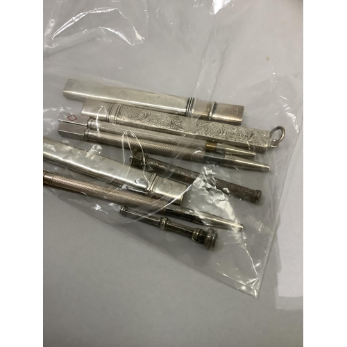 231 - Three silver bridge pencils, three silver cased pencils and two small propelling pencils