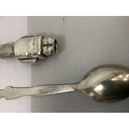 253 - A silver soldier teething ring, Birmingham 1938 and Danish silver spoon