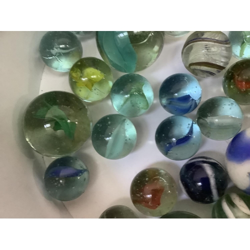 36 - A quantity of vintage marbles