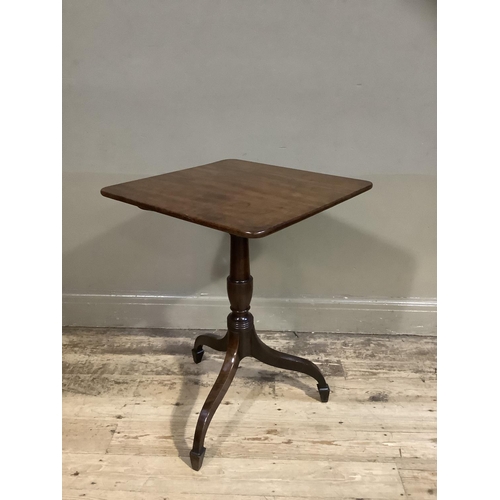 383 - A early 19th century mahogany pedestal table having a rectangular snap top, on a vase turned column ... 