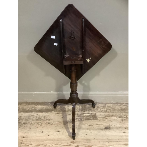 383 - A early 19th century mahogany pedestal table having a rectangular snap top, on a vase turned column ... 