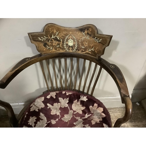 384 - An Edwardian mahogany and rosewood occasional chair inlaid in satinwood and ivorine with a face mask... 