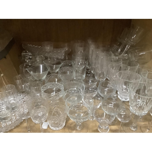 63 - A quantity of mixed glass ware including moulded glass, boat shaped fruit bowl, comport etc