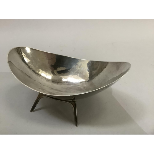 262 - Silver planished bonbon dish, oval, on four plain legs, Chester 1958, approximate weight 4oz