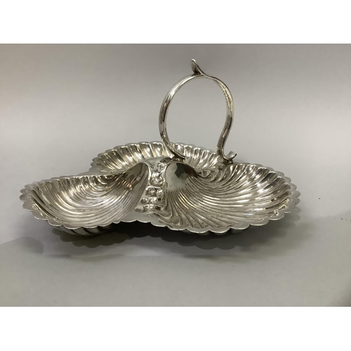 28 - An early 20th century silver plated fruit dish trifoil scalloped form, approximately 25cm by 17cm