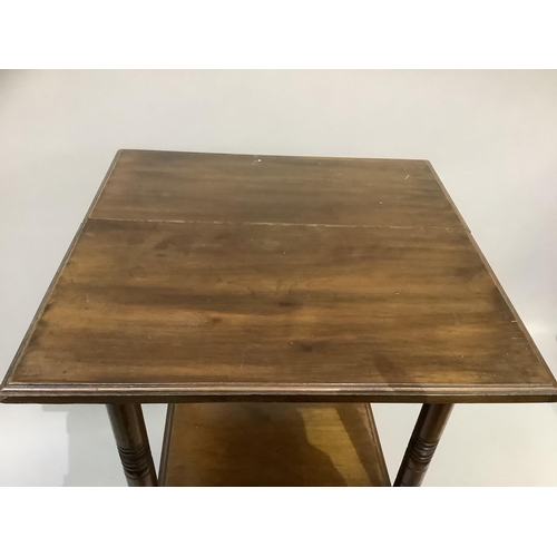 377 - An aesthetic walnut occasional table of square outline on ring turned legs joined by an under tier a... 