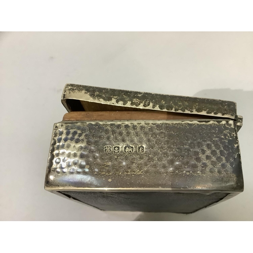 217 - An Edward VII silver cigarette box, planished rectangular outline with open cartouche, approximate 1... 