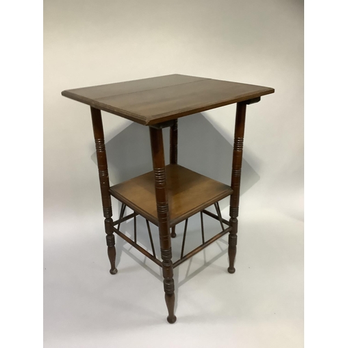 377 - An aesthetic walnut occasional table of square outline on ring turned legs joined by an under tier a... 