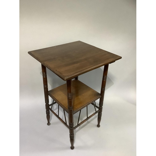 377 - An aesthetic walnut occasional table of square outline on ring turned legs joined by an under tier a... 