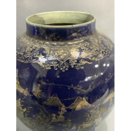 62 - A 19th century Chinese vase of baluster form, blue glaze, painted in gilt with a pagoda river island... 