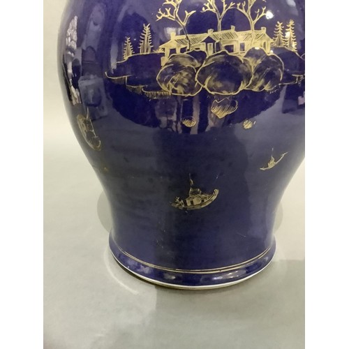 62 - A 19th century Chinese vase of baluster form, blue glaze, painted in gilt with a pagoda river island... 