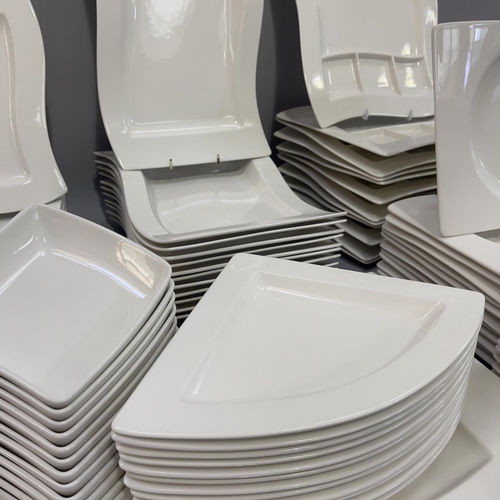 14 - A Villeroy and Boch twelve piece New Wave dinner service comprising pasta dishes 28cm, square plates... 