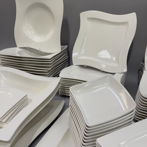 14 - A Villeroy and Boch twelve piece New Wave dinner service comprising pasta dishes 28cm, square plates... 