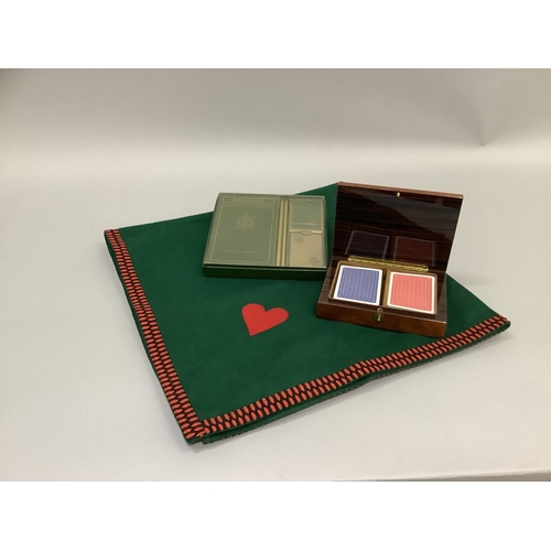 16 - Bridge playing: a card box containing two packs of cards, a Harrods bridge set of score sheets, two ... 