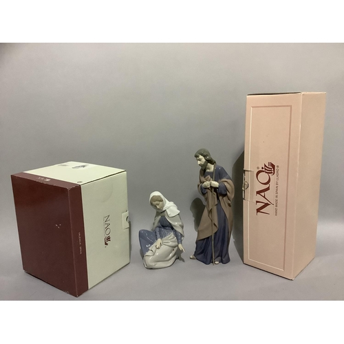 20 - Two Nao figures, Mary and Joseph, 18cm and 28cm high, complete with boxes