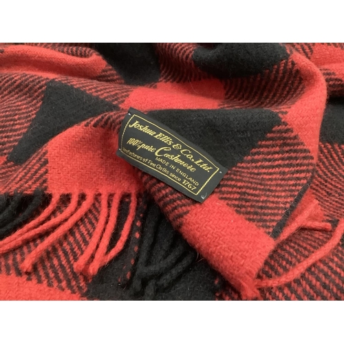 30 - A Joshua Ellis and Co Ltd 100% cashmere travel rug in red and black check