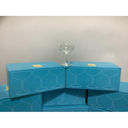 45 - Eight boxes of six champagne coupes in original boxes, 49 glasses in total