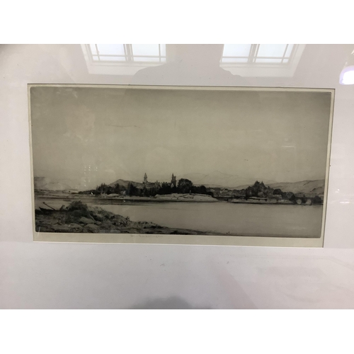 108 - A black and white etching of a lakeside castle, indistinctly signed in pencil to the margin, 19cm x ... 