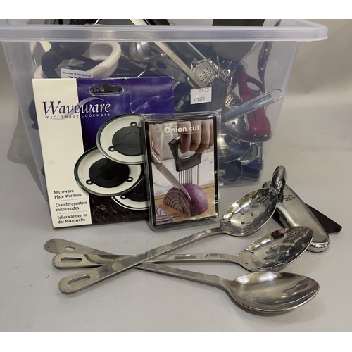 112 - A quantity of cooking utensils, lemon juicer, microwave plate warmers, etc.