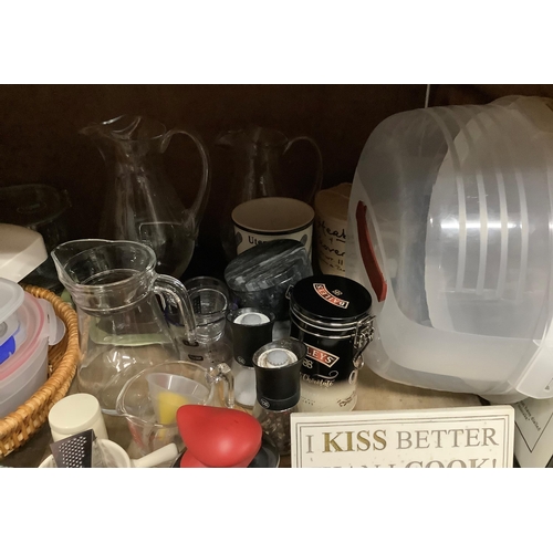 129 - A collection of kitchen ware including cafetieres, water jugs, cruets, egg separator, mini grater, p... 