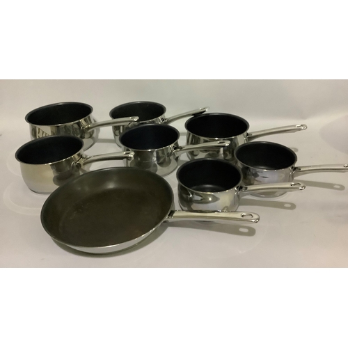 145 - A set of eight Jonelle saucepans and a frying pan