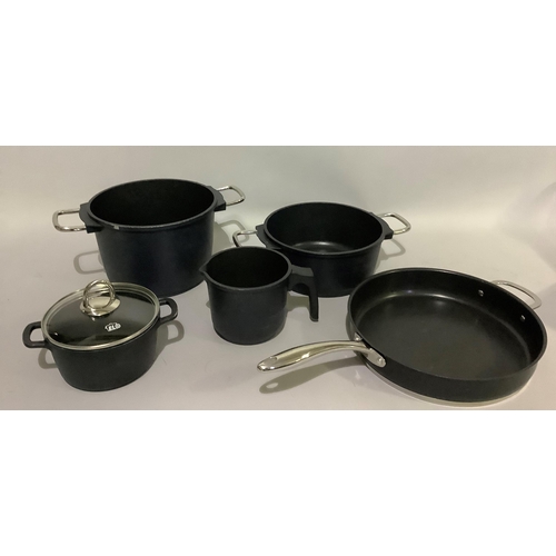 152 - An Aga cast iron and stainless steel frying pan, a WMF cast iron two-handled stock pan with glass co... 