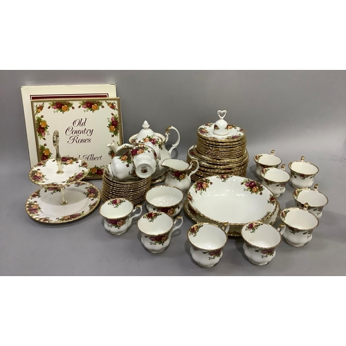 79 - A Royal Albert Old Country Roses tea service comprising teapot and stand, sugar and cream, twelve te... 