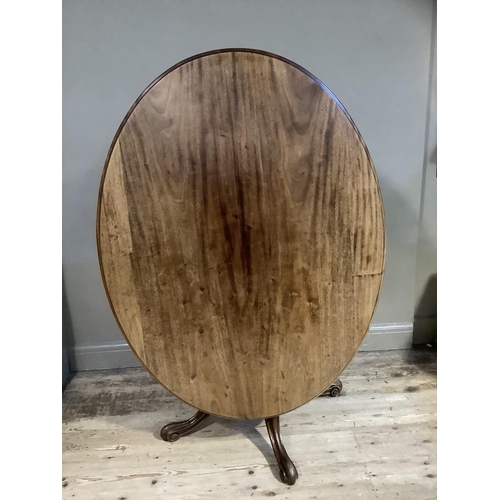 167 - A 19th century mahogany oval tilt top breakfast table on turned pedestal with four cabriole legs, 13... 