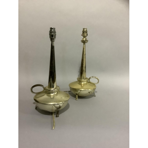 173 - A matched pair of silver plated table lamps with tapered columns and circular reservoirs, loop handl... 