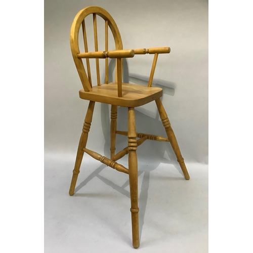 163 - A child's beech high chair with rail back