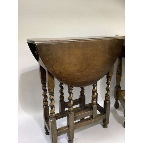 164 - A small oak oval drop leaf occasional table on turned framing together with an oak oval gateleg tabl... 