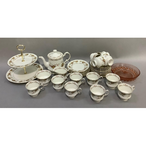 200 - A Caprice tea service by Elizabethan China comprising twelve cups and saucers, milk and sugar, teapo... 