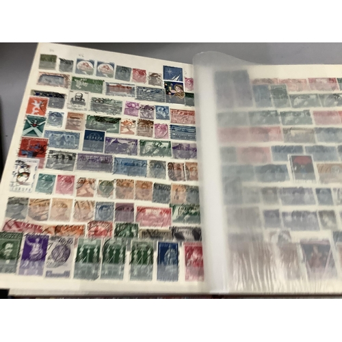 229 - Four albums of stamps, various