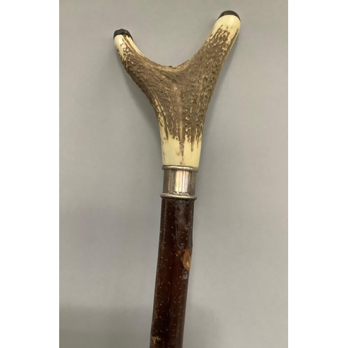 433 - A silver mounted hazel and antler thumb stick, approximate length 117cm