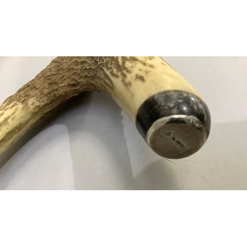 433 - A silver mounted hazel and antler thumb stick, approximate length 117cm